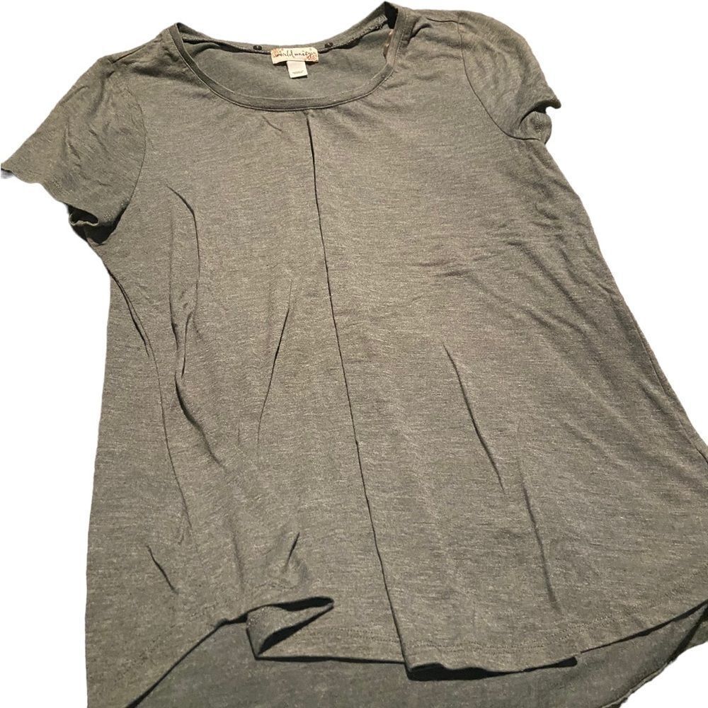 World Unity size small beautiful top new never worn